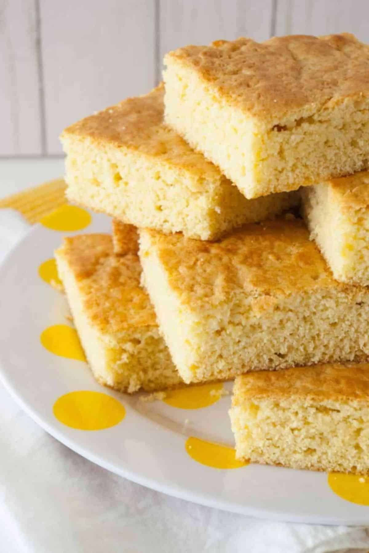 A pile of Breakfast Honeycakes on a white plate.