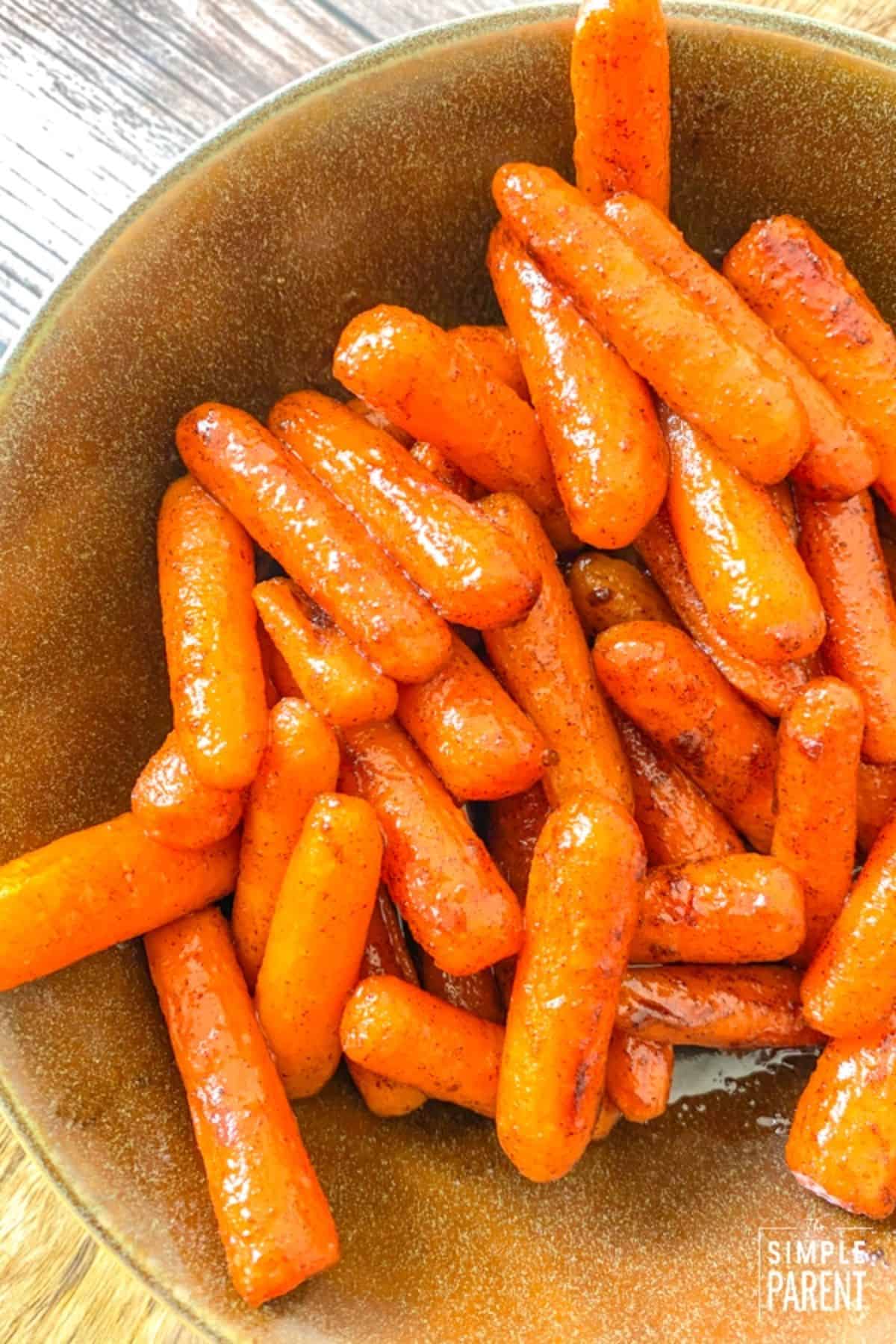Healthy Brown Sugar Glazed Carrots in a gray bowl.