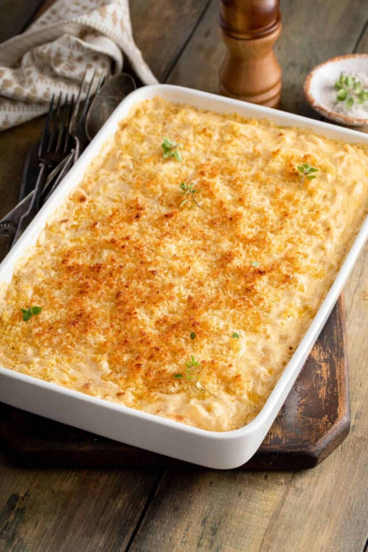 Delicious Homemade Baked Mac & Cheese in a white casserole.
