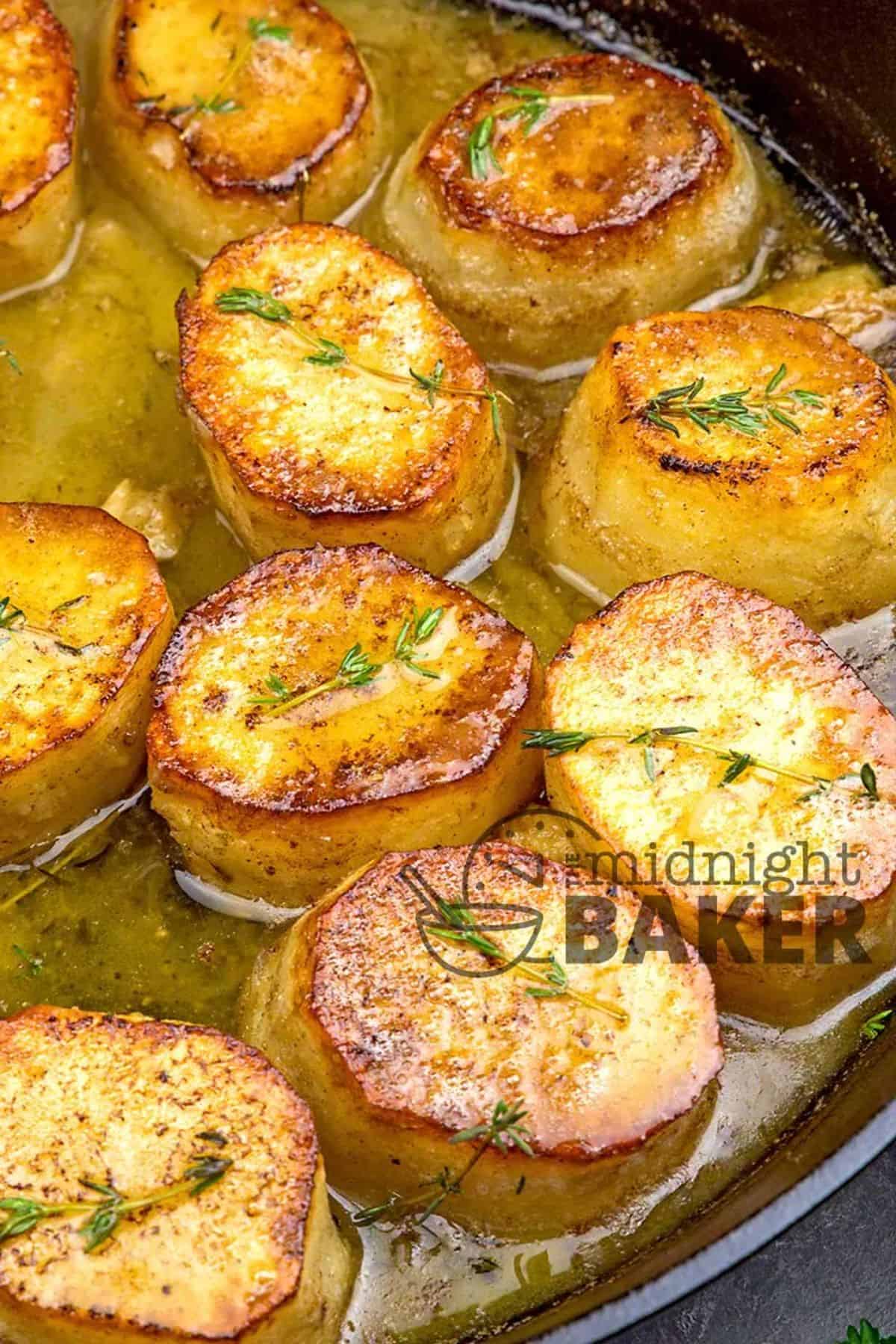 Scrumptious Melting Potatoes in a skillet.