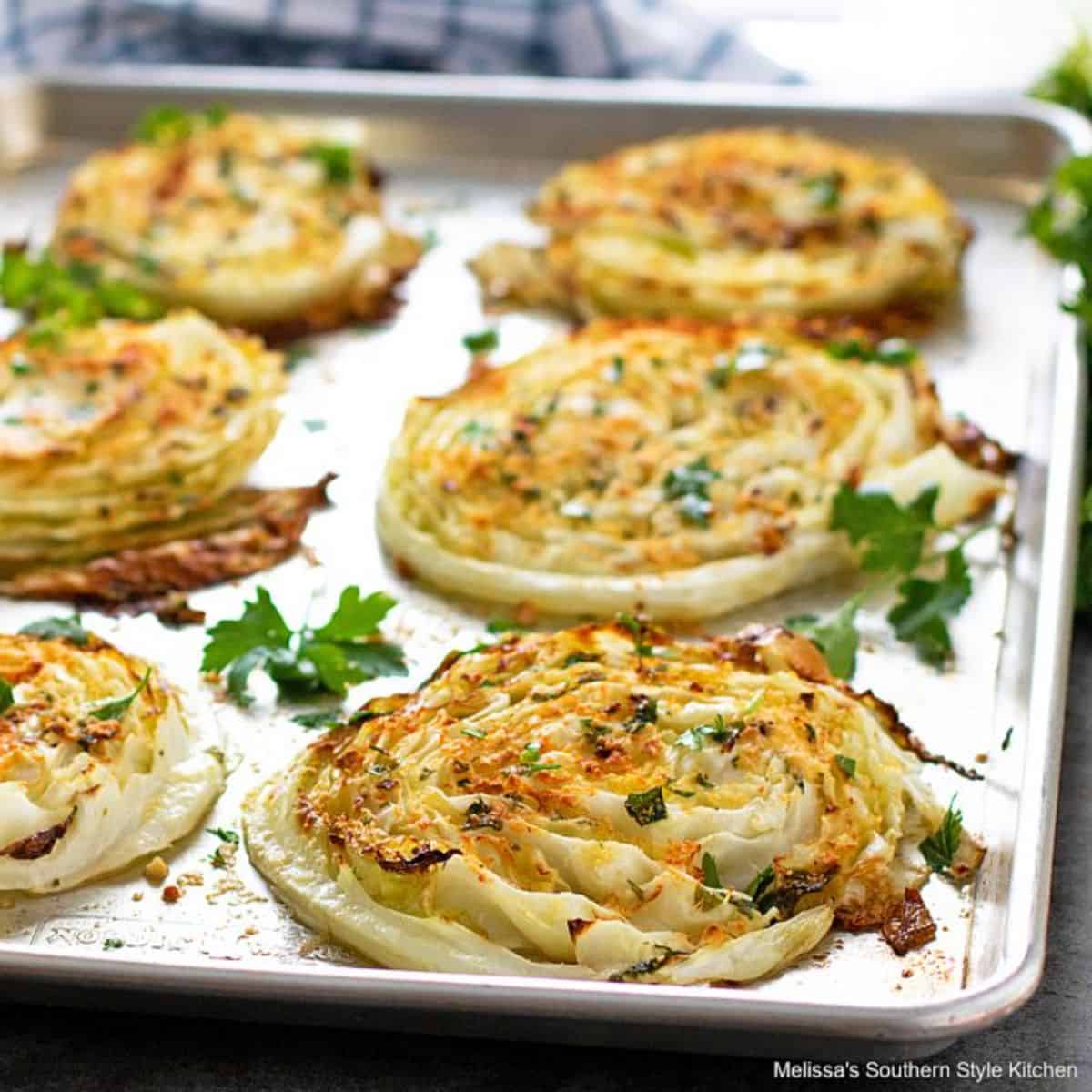 Delicious Oven Roasted Cabbage Steaks on a baking tray.