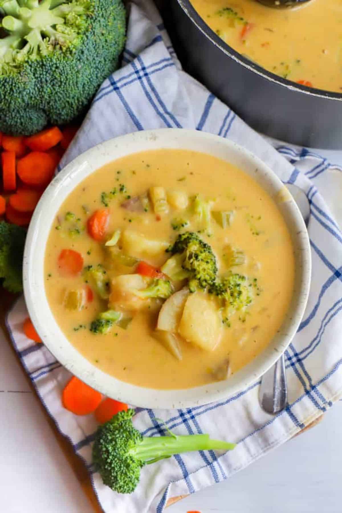 Delicious Broccoli Potato Cheese Soupin a white bowl.