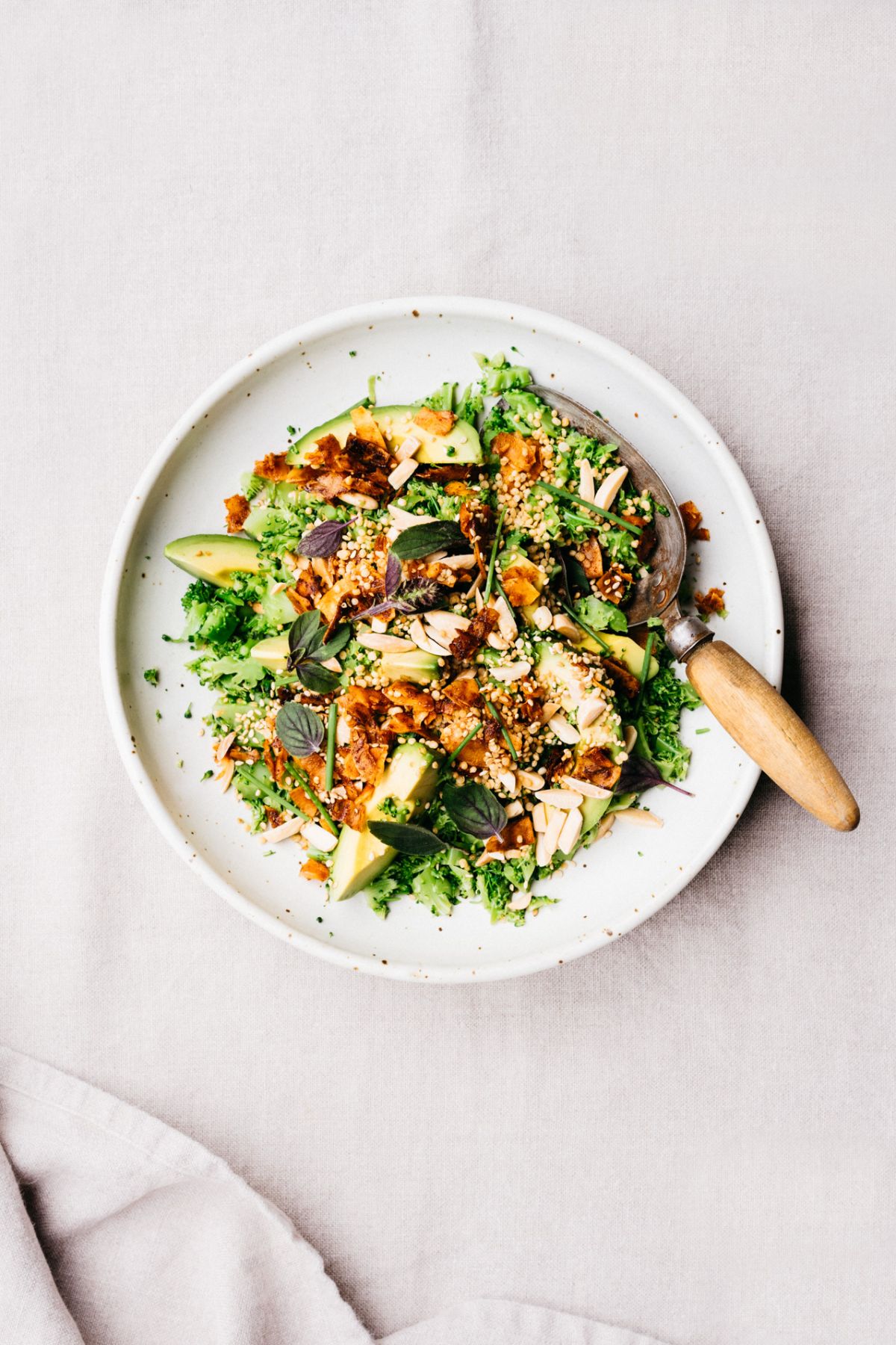 Healthy Broccoli Crunch Salad on a white plate.